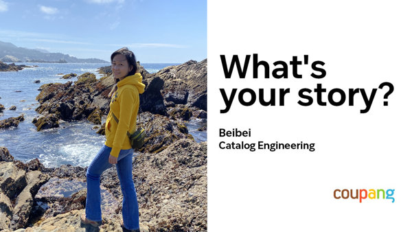 a person standing on rocks near water