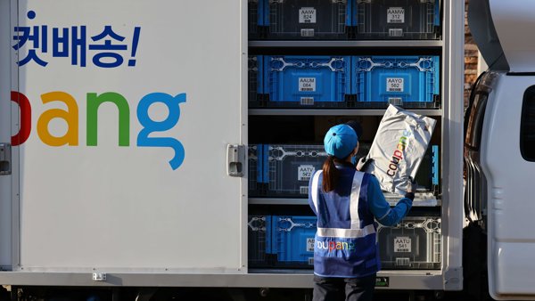 a person loading a truck