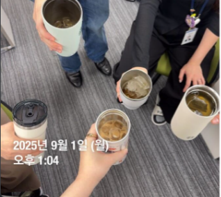 A group of people holding cups

AI-generated content may be incorrect.