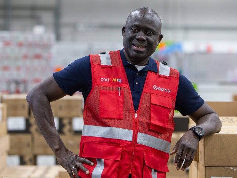 a person in a red vest