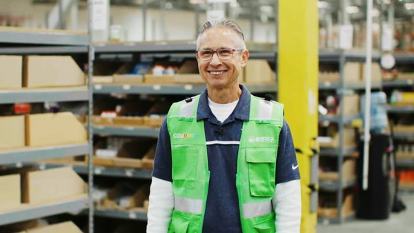 a person in a green vest