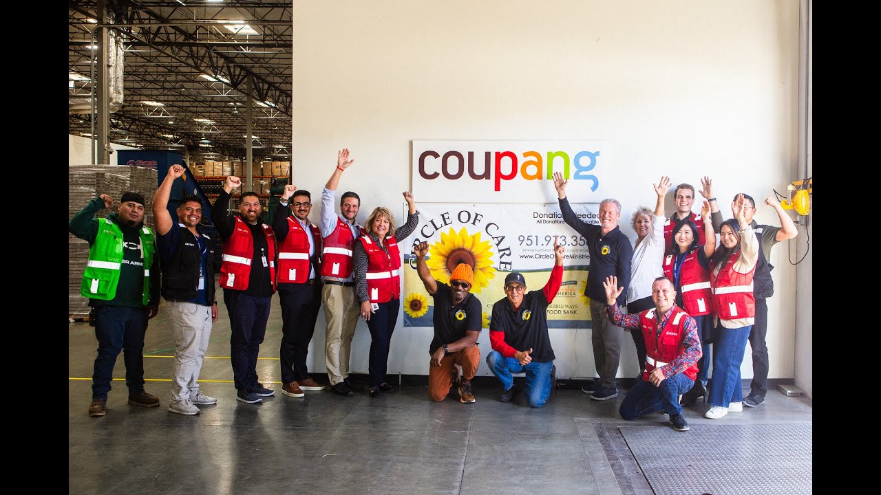 a group of people posing for a photo