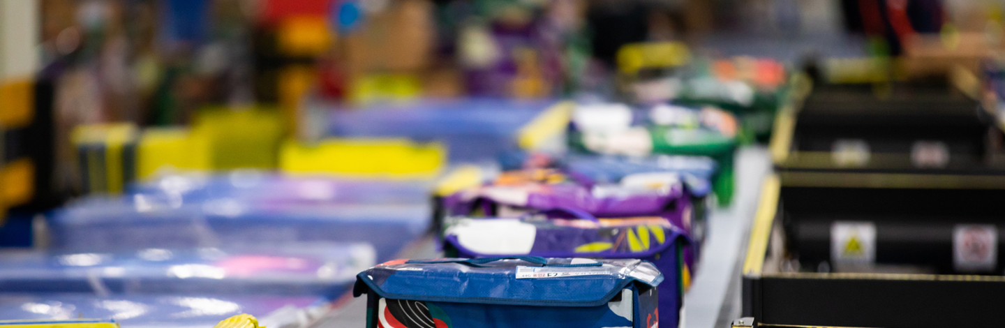 a conveyor belt with packages on it