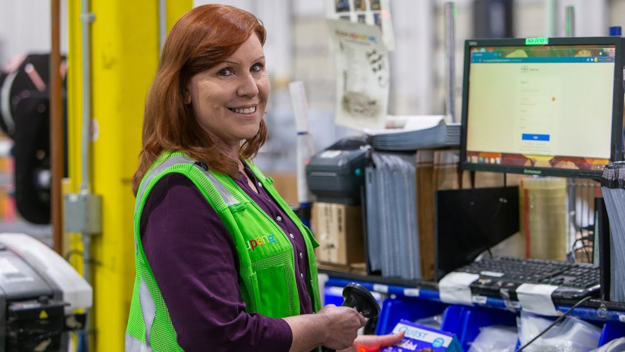 a person in a green vest