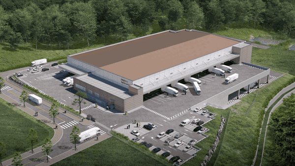 a building with cars parked in a parking lot