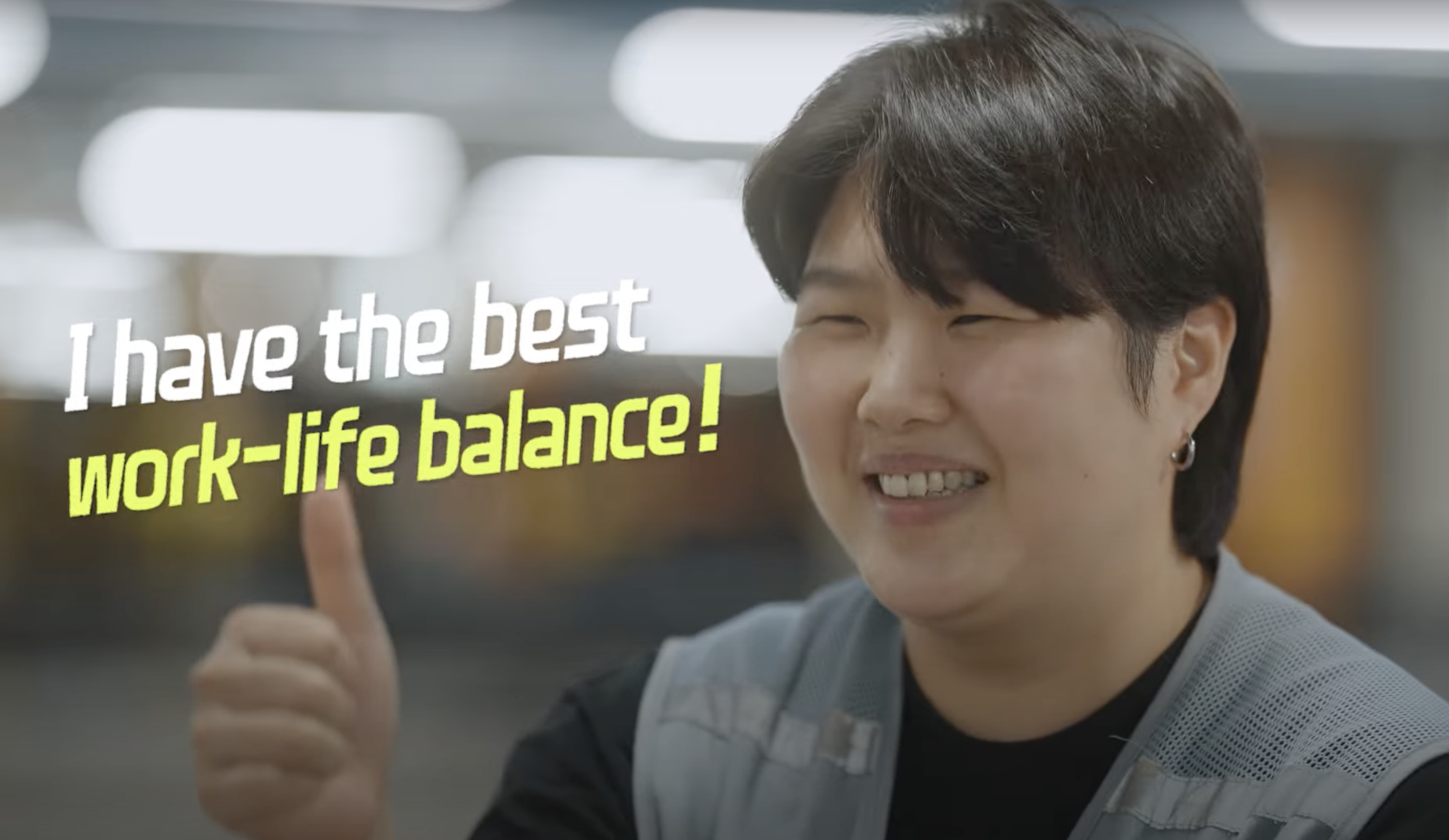 a person pointing up with her finger