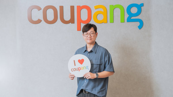 a person holding a sign