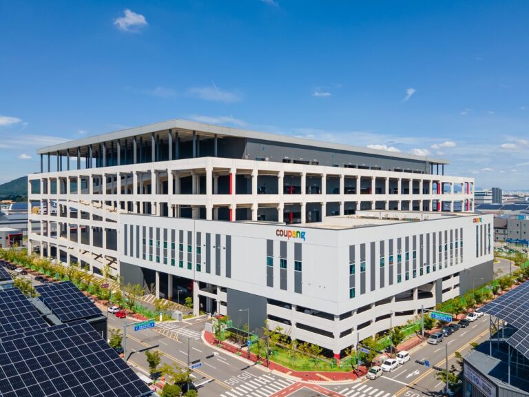 a large building with solar panels