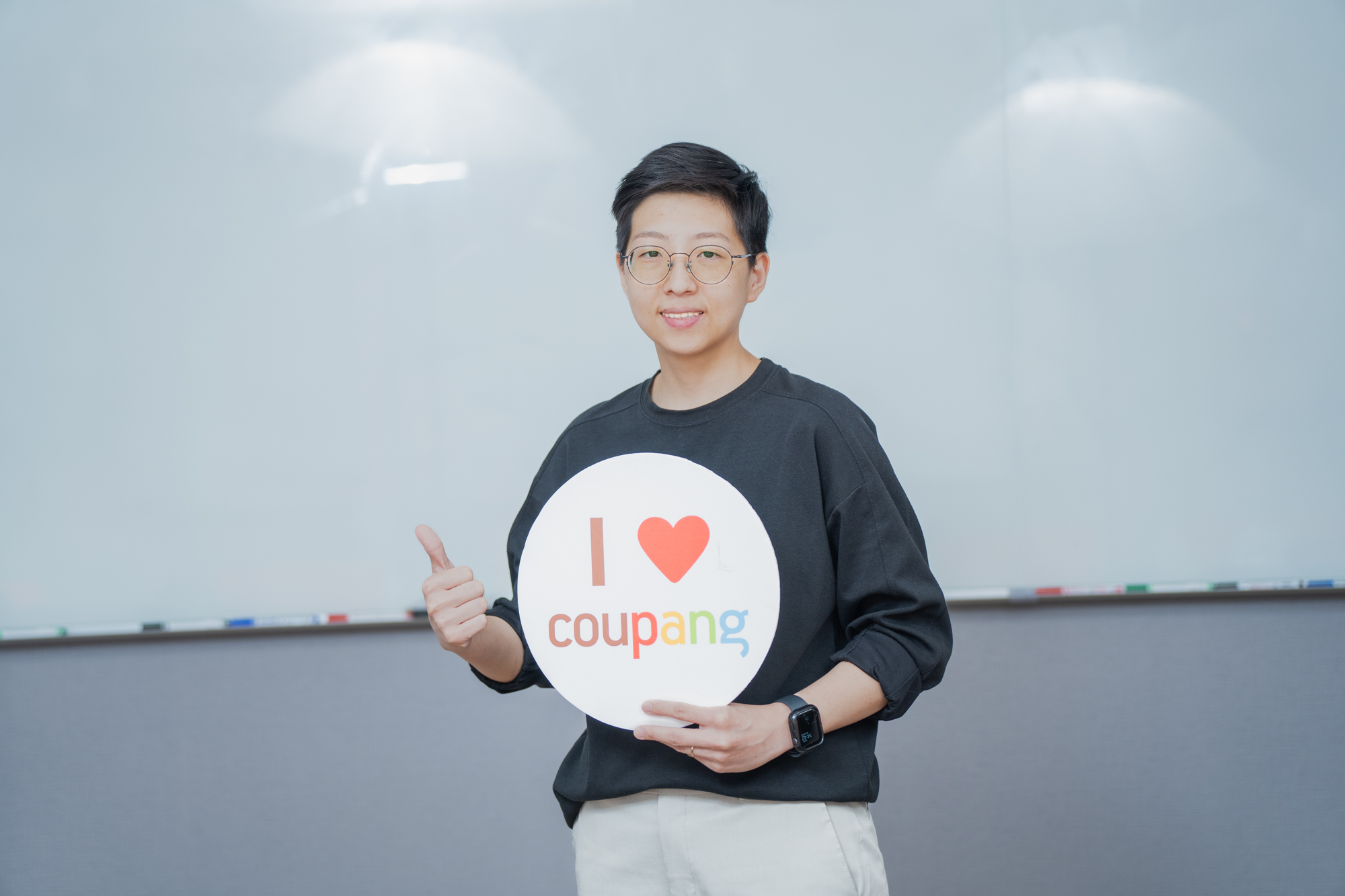 a person holding a sign