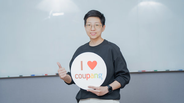 a person holding a sign