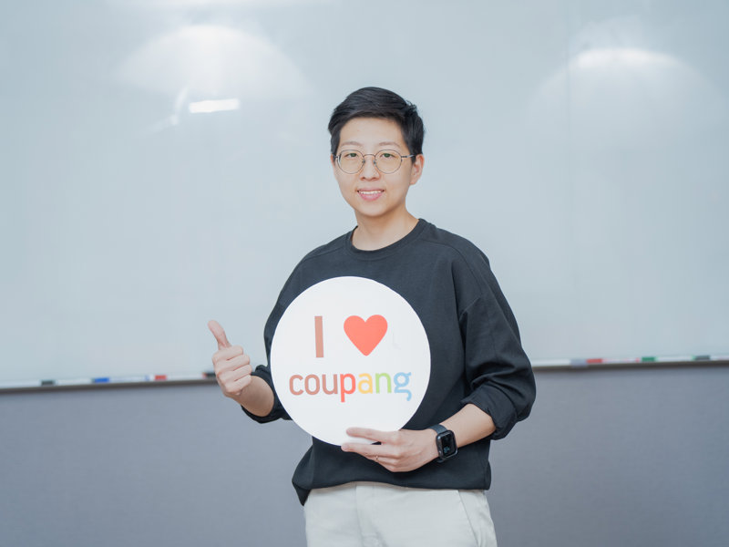 a person holding a sign