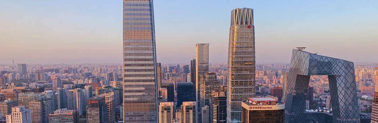 a group of tall buildings in a city