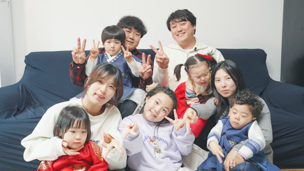 a group of people posing for a photo