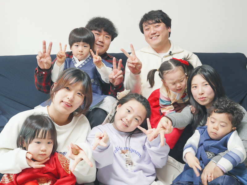 a group of people posing for a photo