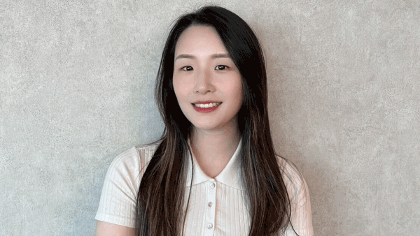 a person smiling at camera