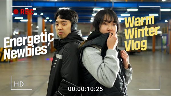 a person and person standing back to back