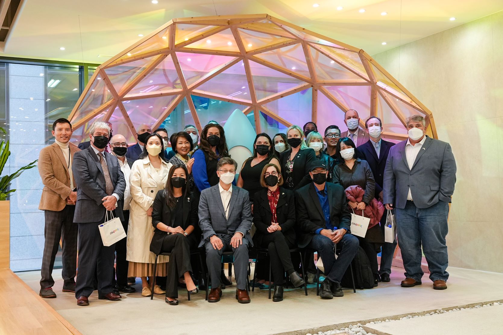a group of people wearing face masks