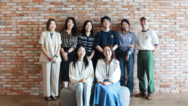 a group of people posing for a photo