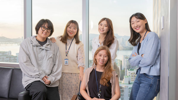 a group of people posing for a photo