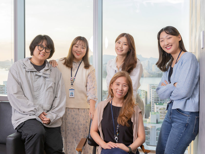 a group of people posing for a photo
