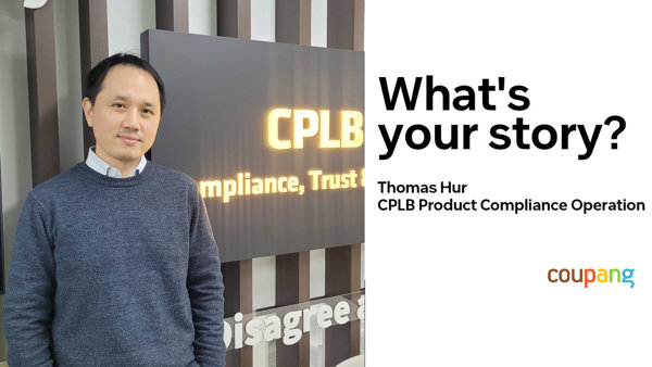 a person standing in front of a sign