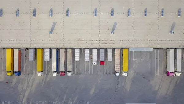 a aerial view of a parking lot with trucks