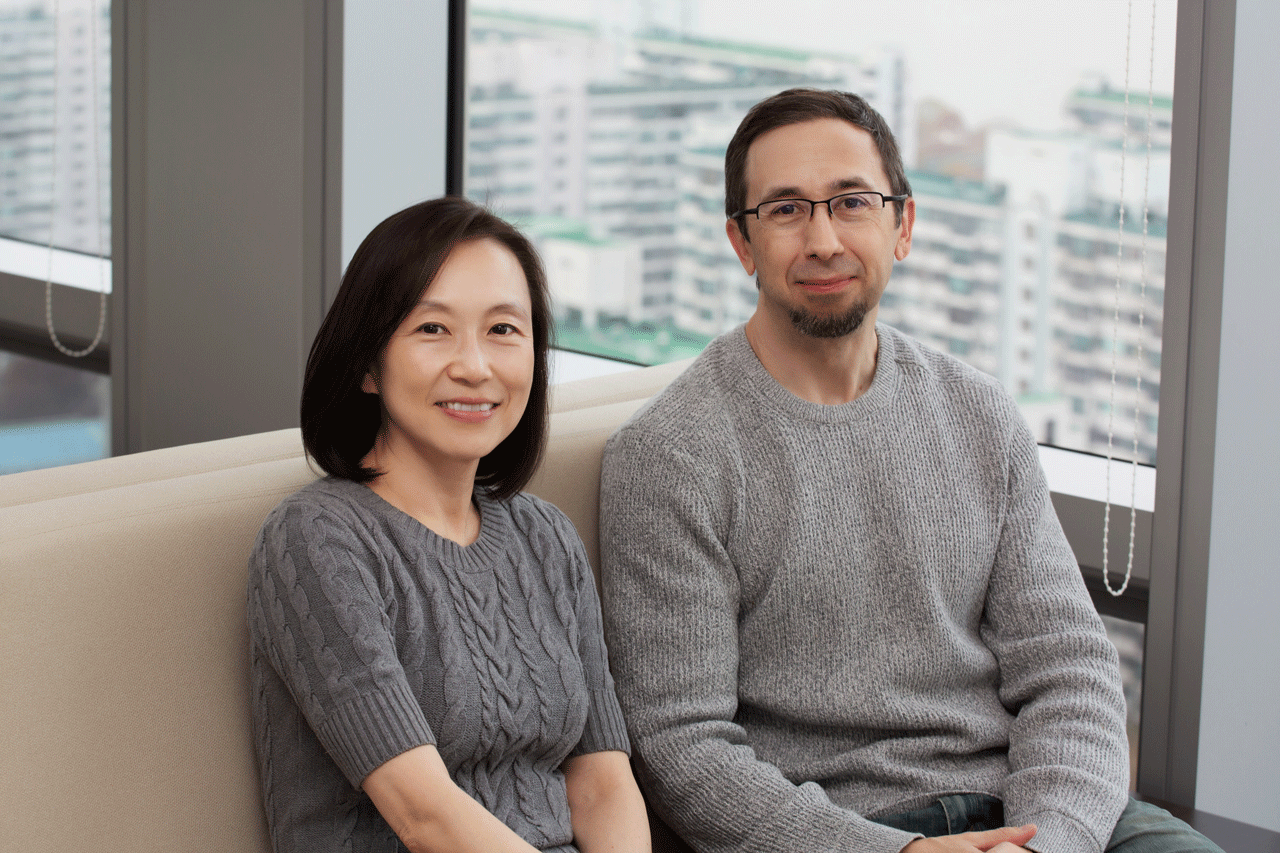 a person and person sitting on a couch