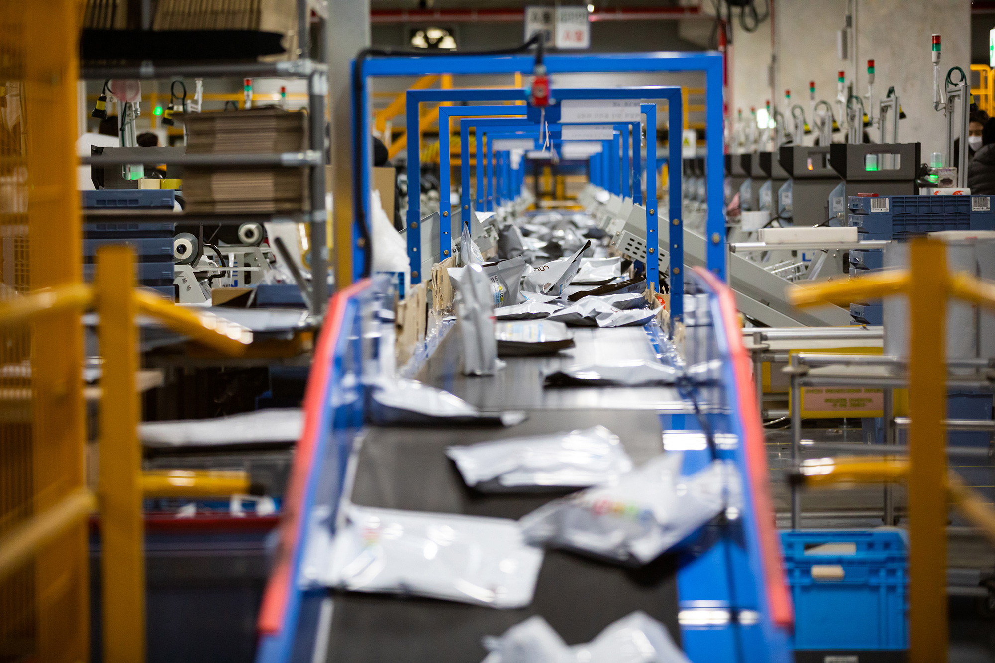 a conveyor belt with packages on it