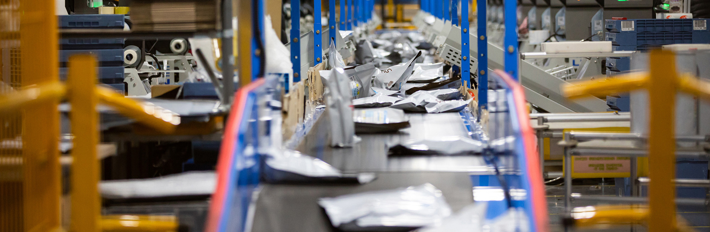 a conveyor belt with packages on it